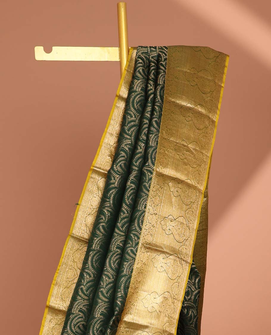 Green geometric design kancheepuram silk saree with contrast floral zari border & pallu of paisley design