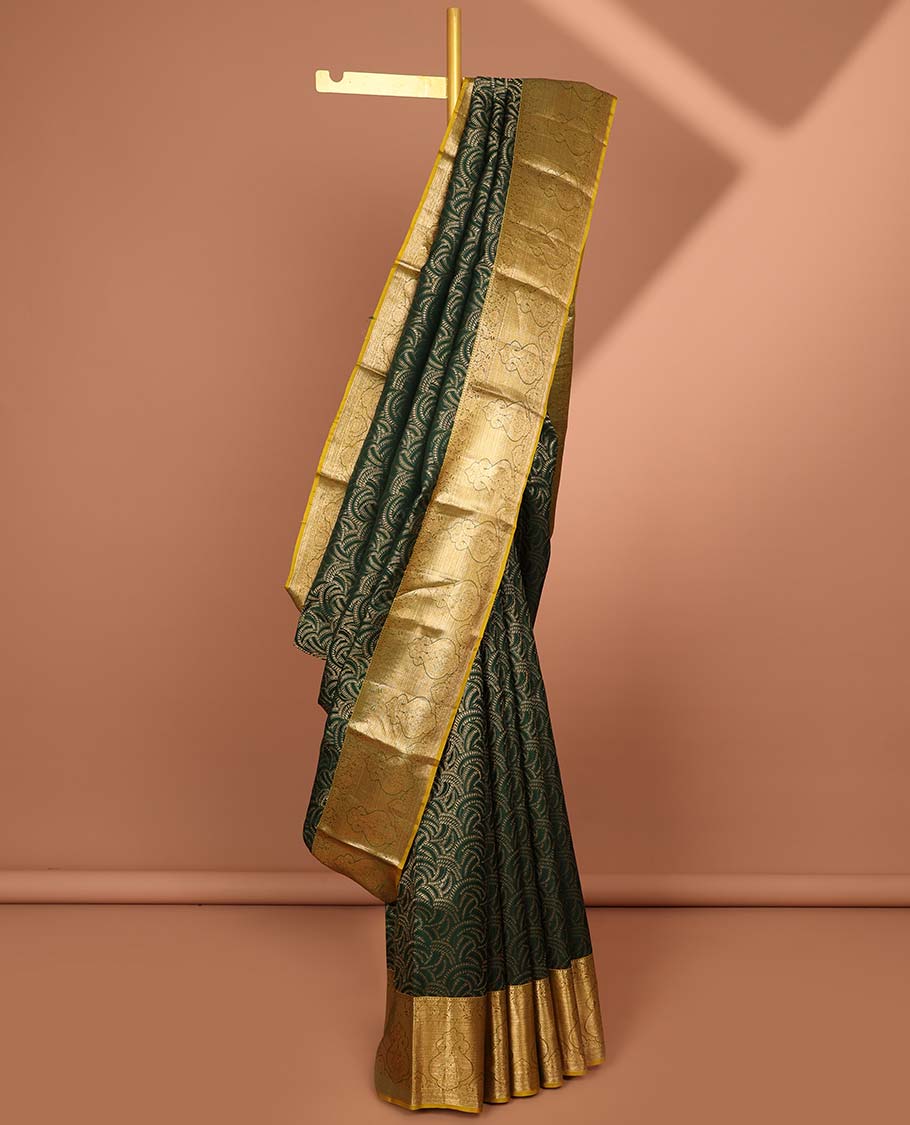 Green geometric design kancheepuram silk saree with contrast floral zari border & pallu of paisley design