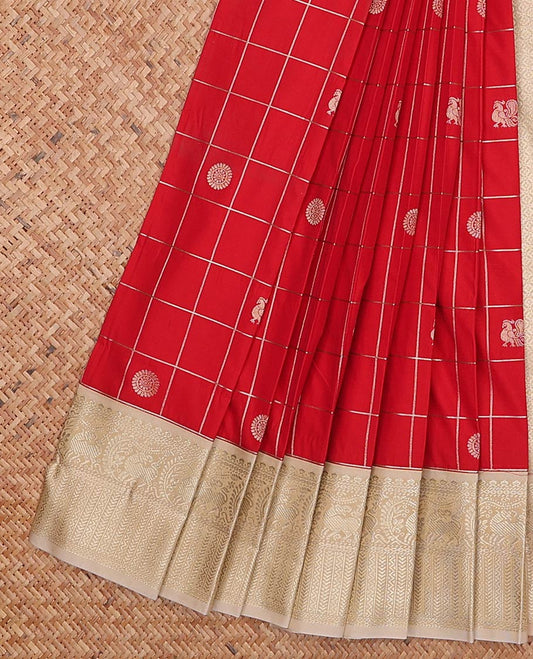 Red peacock and chakram motif enclosed checked gift saree, contrast traditional zari border of yaali motifs, and jaal pallu