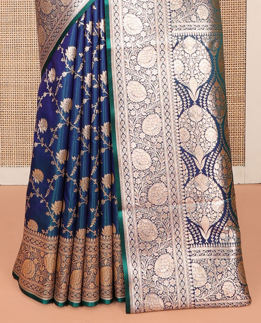 Peacock Blue Banarasi Nylon Saree, Uniquely Detailed with Jacquard, a Floral Creeper Zari Border, Intricate Pallu, and a Matching Blouse