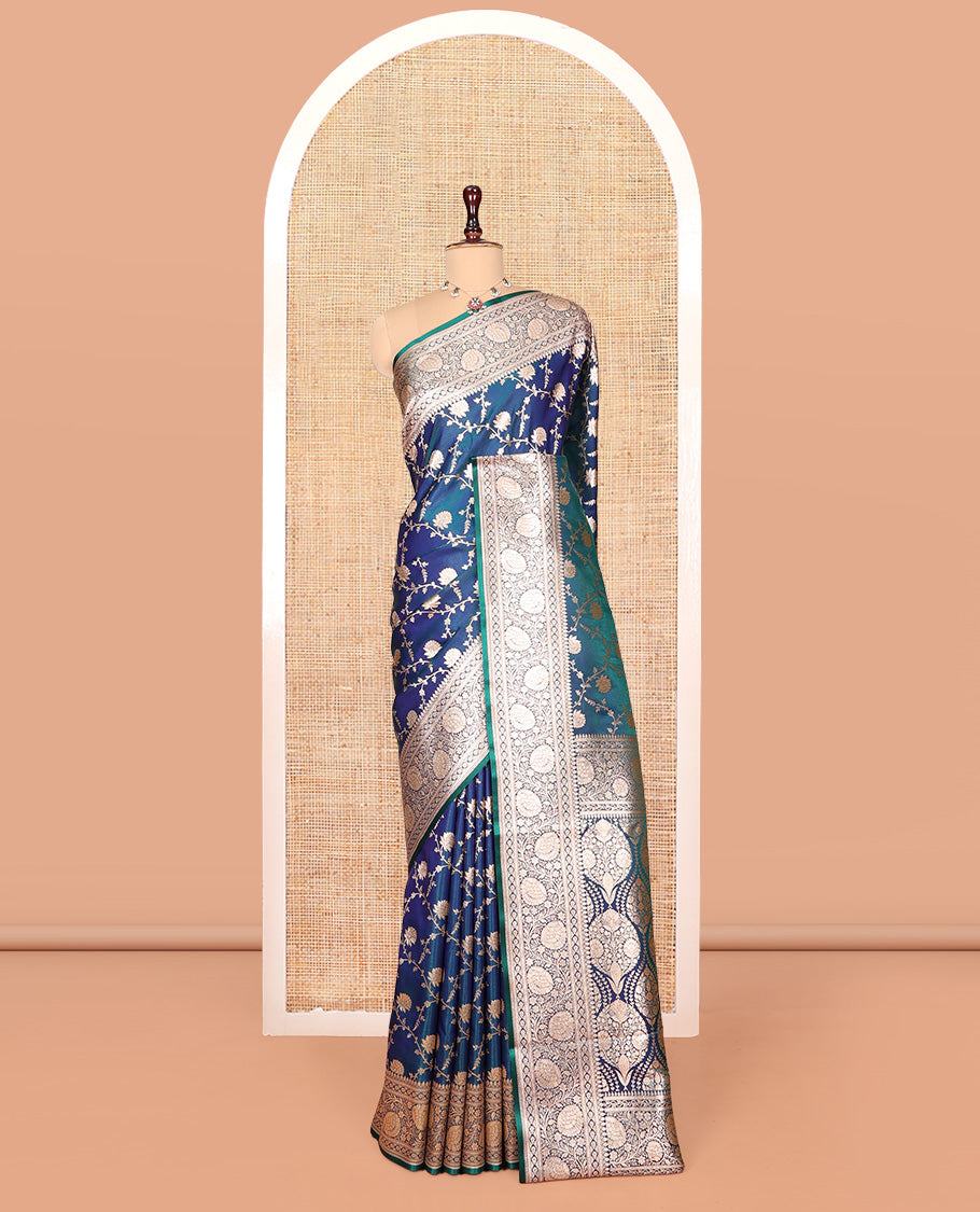 Peacock Blue Banarasi Nylon Saree, Uniquely Detailed with Jacquard, a Floral Creeper Zari Border, Intricate Pallu, and a Matching Blouse
