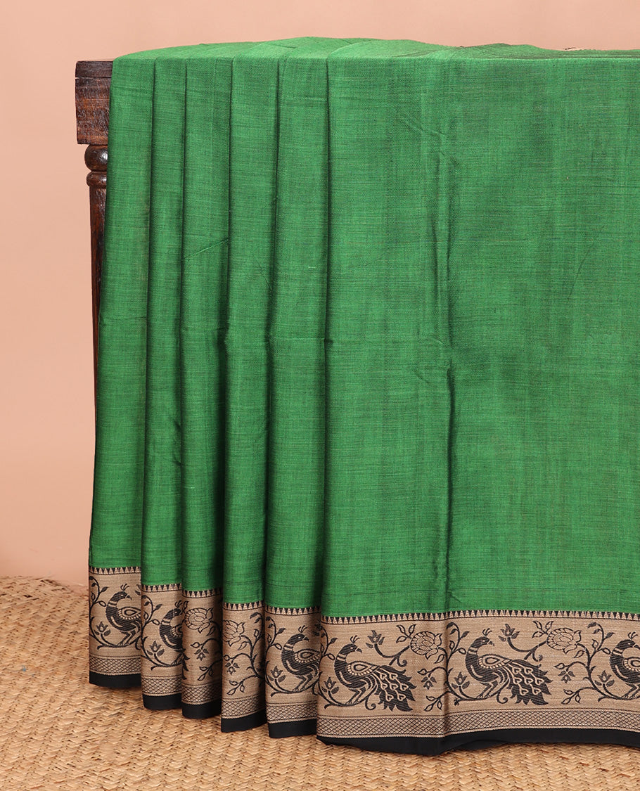 Green plain Narayanapet cotton saree, contrast temple border of peacock motifs, and striped pallu