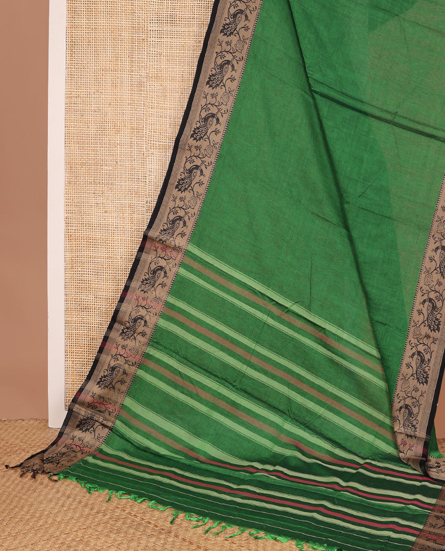Green plain Narayanapet cotton saree, contrast temple border of peacock motifs, and striped pallu
