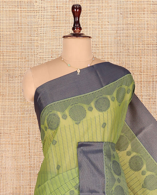 Green Semi-Silk Cotton Saree, Finely Crafted with Buttas and Checks All Over Its Body, Complemented by a Contrast Border, Pallu of Jaal Designs, and Paired with a Matching Blouse