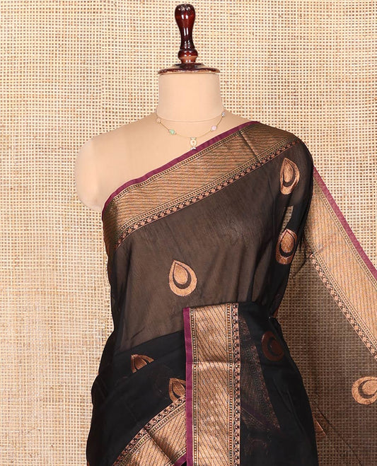 Black Semi-Silk Cotton Saree, Beautifully Bedecked with Zari Buttas on Its Body, Complemented by Contrast Traditional Zari Border, Zari-Rich Pallu of Jaal Designs, and Paired with a Contrast Blouse