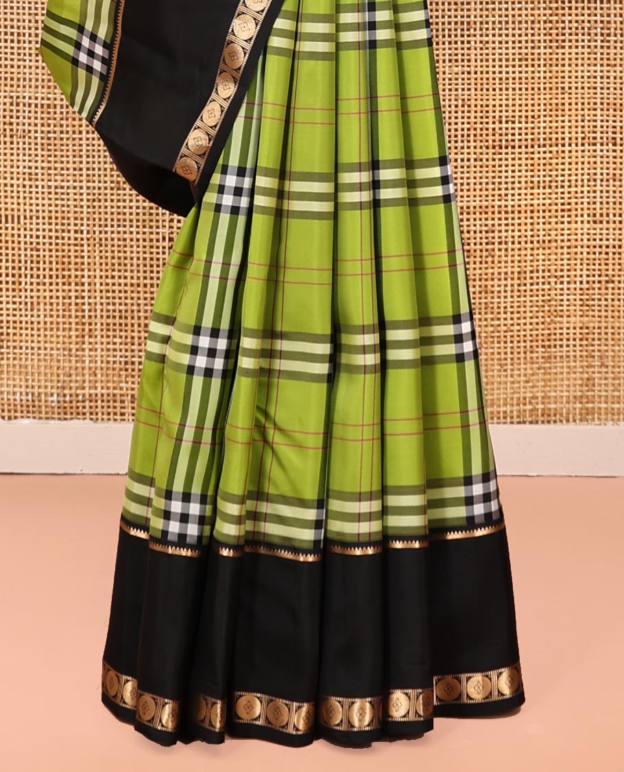 Green-Black Vasundhara Lite Silkmix Saree Features Checks, Contrast Rettai Pettu Rekku-Poun Border, Zari-Striped Pallu, and a Contrast Blouse