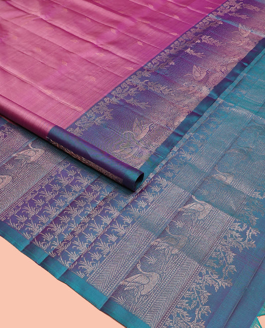 Pink zari buttas soft silk saree, contrast pond-theme zari woven border of floral and swan motifs, and intricate pallu