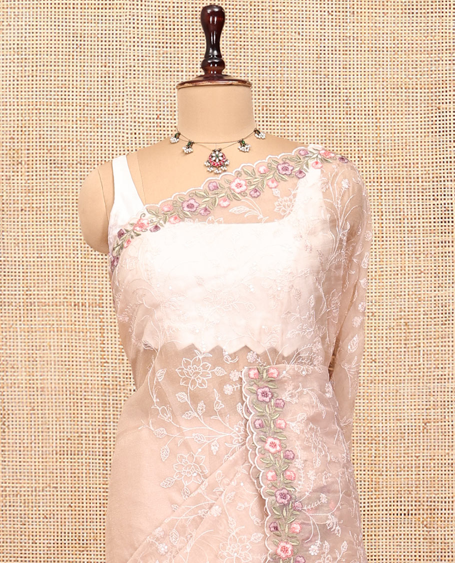 Beige Organza Saree, Steeped in the Richness of Floral Vine Embroidery, a Scallop Floral Embroidery Border, and a Matching Blouse