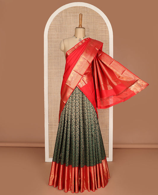 Green pure-silk half-saree, jacquard skirt, contrast blouse, and border of Mughal-style zari designs, and intricate dhavani