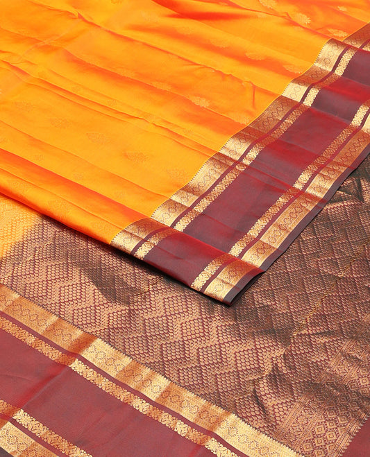 Mango yellow zari design vasundhara silk mix saree, contrast border of thilakam,muthu,neli, diamond & cross kamalam & geometric patterned pallu