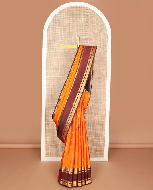 Mango yellow zari design vasundhara silk mix saree, contrast border of thilakam,muthu,neli, diamond & cross kamalam & geometric patterned pallu