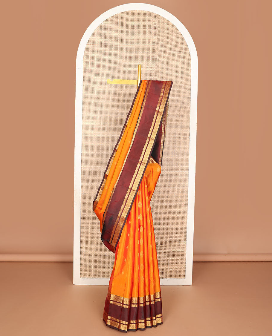 Mango yellow zari design vasundhara silk mix saree, contrast border of thilakam,muthu,neli, diamond & cross kamalam & geometric patterned pallu