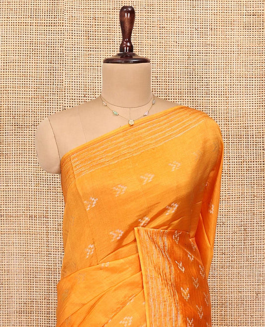 Orange Banana Pith Saree, Finely Woven with Buttas All Over Its Body, Subtle Self-Border of Stripes and Buttas, Pallu Steeped with Stripes, and Paired with a Matching Blouse