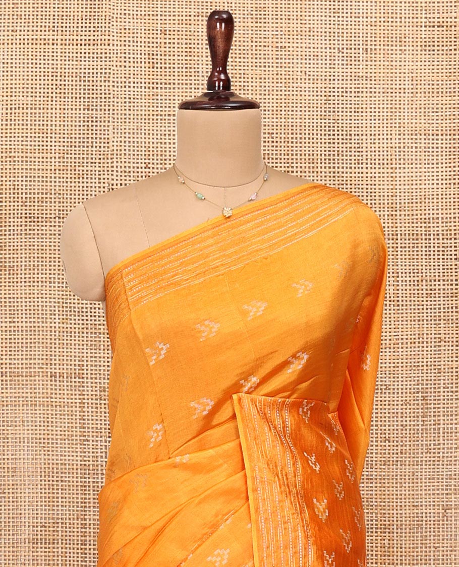 Orange Banana Pith Saree, Finely Woven with Buttas All Over Its Body, Subtle Self-Border of Stripes and Buttas, Pallu Steeped with Stripes, and Paired with a Matching Blouse