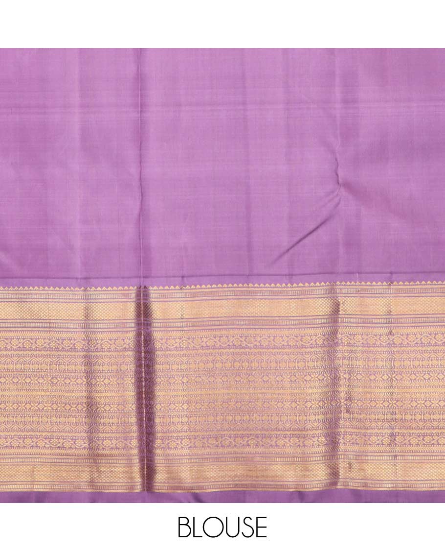 Peach puresilk halfsaree, zari buttas skirt, contrast border, blouse of rekku,banaras,muthu,mayil kann,rettai neli,poun,kathir,rudraksham, and kodi visiry, and zari woven dhavani