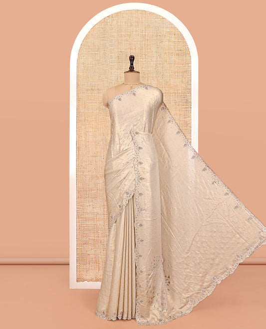 Champagne Designer Saree, Embellished with Stone Work On Its Body, Scallop Embroidered Border, and Heavy Embroidered Matching Blouse