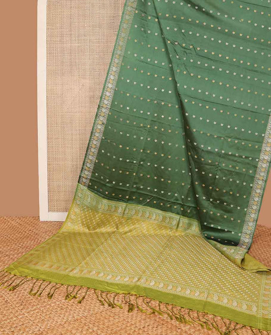 Green paisely motifs soft silk saree with self zari design border & floral design pallu