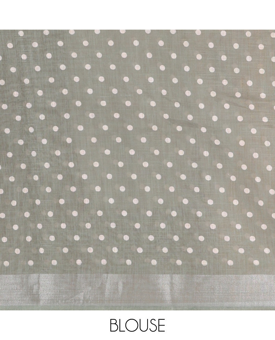 Cream and Green Plain Linen Cotton Saree, Subtly Ombre-Style Dual-Color Dye on Its Body, Subtle Bavanji Zari Border, Pallu Features Rangoli-Style Patterns Print, and Paired with a Polka Dots Printed Blouse