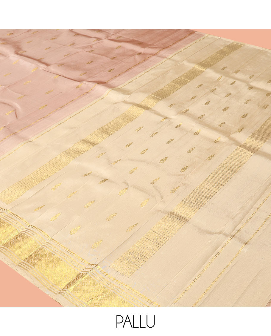 Light Sandal Kanchipuram Silk Saree, Subtly Sparkled with Buttas, a Contrast One-Sided Border of Panner Sombu, Banaras, Muthu, and Jaal Designs, a Zari Design Pallu, and No Blouse
