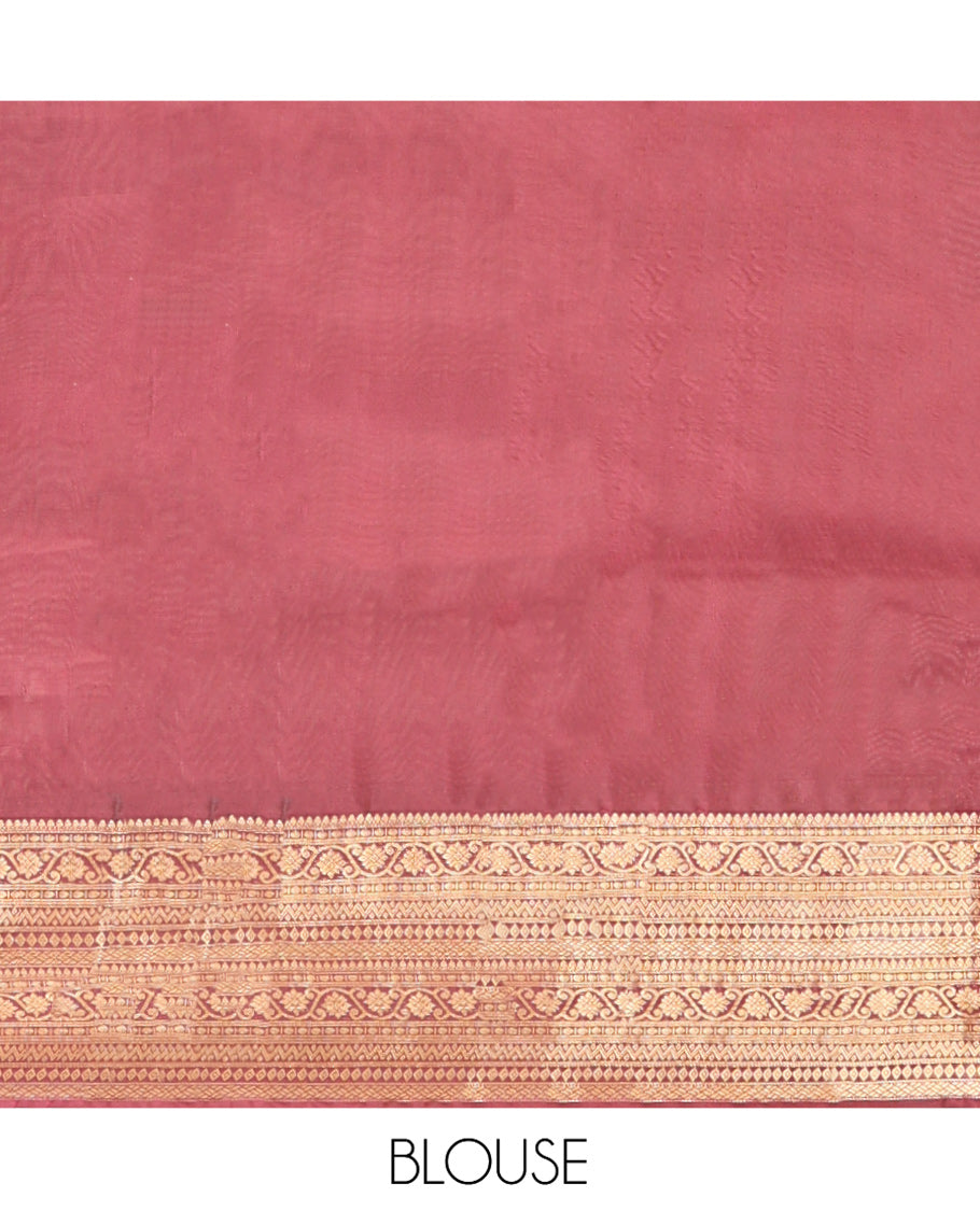 Light Brown Vasundhara Lite Silk Mix Saree, Ornamented With Zari Buttas All Over Its Body, Complemented by Contrast Border of Thilakam Mokku, Kodi Visiry, Neli, Diamond, and Paiyadi Kattam, Grand Pallu and Paired with a Contrast Blouse