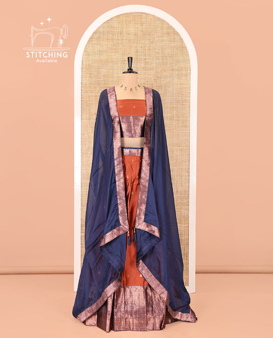 Rust-Blue Semi-Banarasi Half-Saree Features Zari Buttas Skirt, a Contrast Traditional Zari Border, a Matching Blouse, and a Contrast Satin Georgette Dhavani