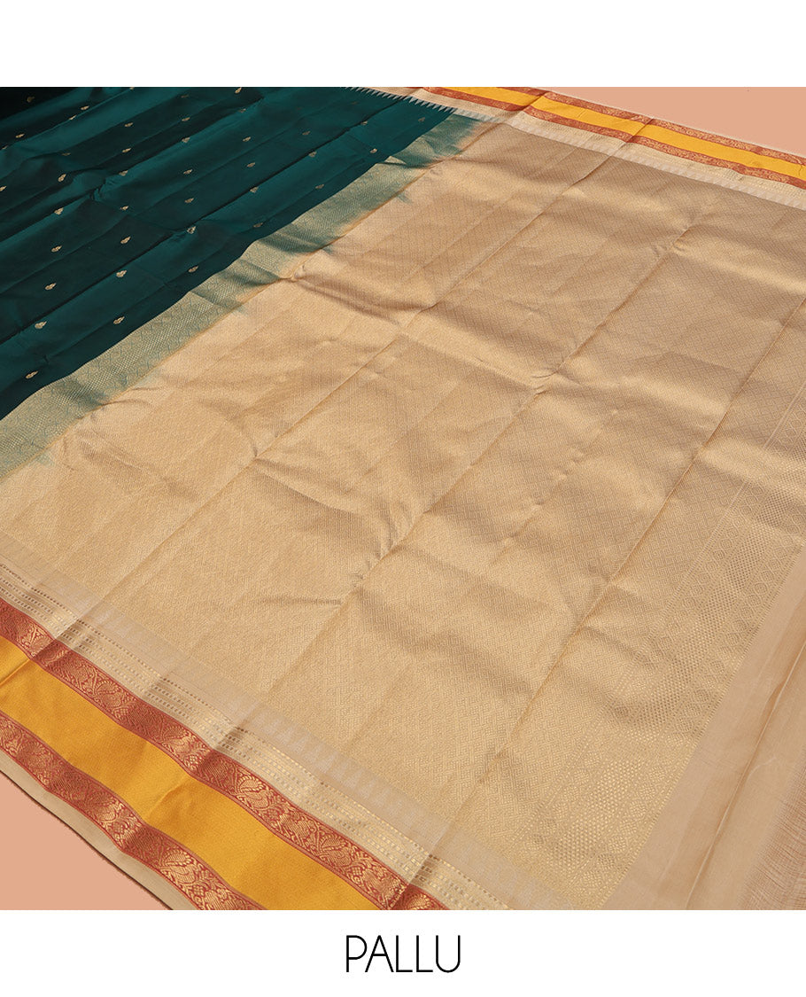 Teal Vasundhara Lite-Silk Mix Saree, Decked Up with Zari Buttas, Contrast Temple Border of Mayil Design, Paiyadi Kattam Pallu, and a Contrast Blouse
