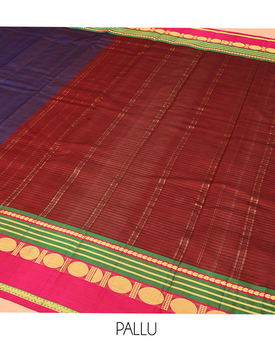 Blue Kanchipuram Silk Saree, Subtly Sparkled with Stripes All Over Its Body, Complemented by a Contrast Border of Manga, Banaras, Poun, and Rettai Neli Designs, Pallu of Zari Stripes, and Paired with a Contrast Blouse