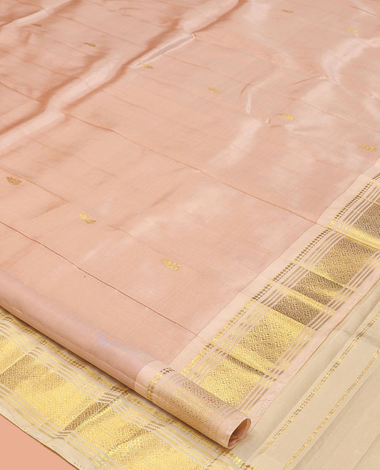 Light Sandal Kanchipuram Silk Saree, Subtly Sparkled with Buttas, a Contrast One-Sided Border of Panner Sombu, Banaras, Muthu, and Jaal Designs, a Zari Design Pallu, and No Blouse