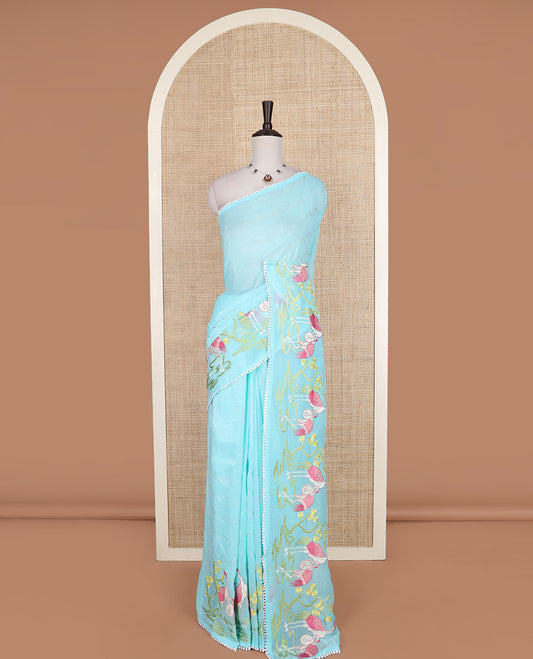Blue chevron striped and flamingo motifs designer saree, pom-pom lace border, and chevron striped pallu