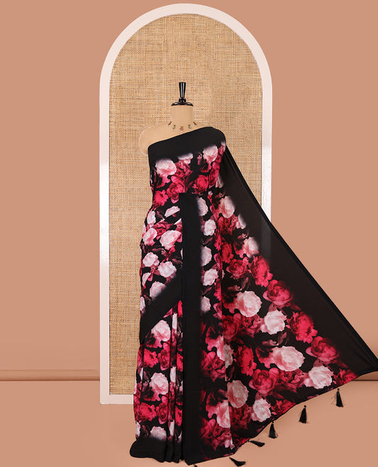 Borderless black and rani pink floral printed satin crepe saree, floral printed pallu, and a matching floral printed blouse