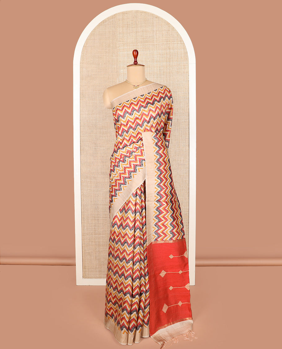 Multi-color chevron design printed tussar saree, contrast border, and pallu of stripes and diamond designs