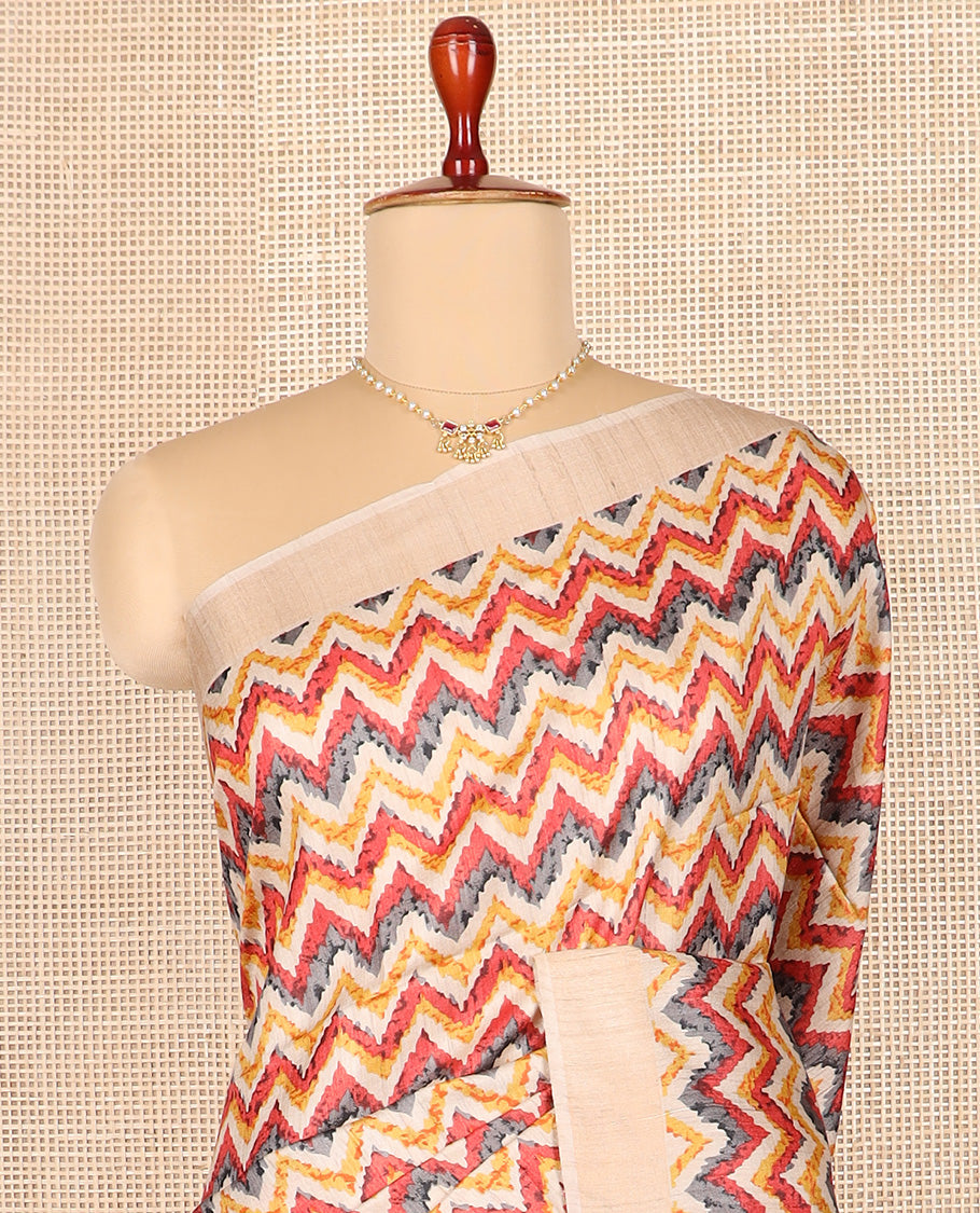 Multi-color chevron design printed tussar saree, contrast border, and pallu of stripes and diamond designs