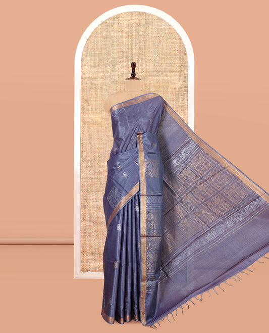 Grey Tussar Saree, Enriched with Warli Buttas, a Subtle Zari Border, Pallu of Warli Designs, and a Matching Blouse