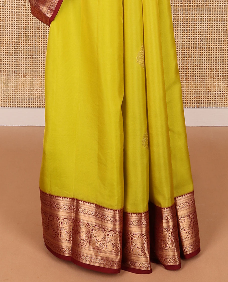 Light green buttas vasundhara elite silk saree with contrast traditional zari design border & checked floral design pallu