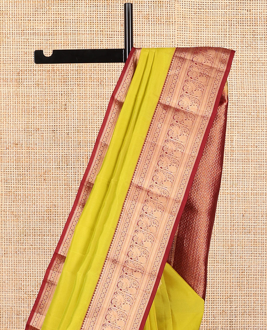 Light green buttas vasundhara elite silk saree with contrast traditional zari design border & checked floral design pallu
