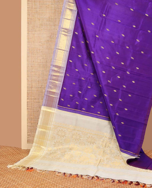 Blue buttas kancheepuram silk saree with contrast border of zari design & floral design pallu