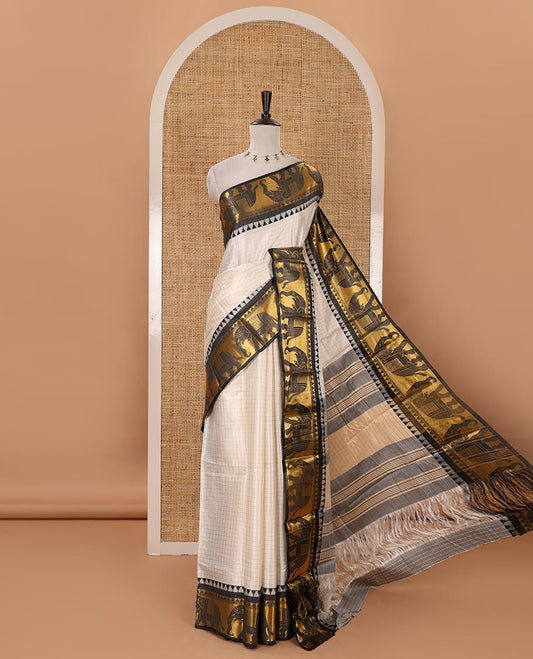 White checked semi-tafeta saree, contrast temple zari elephant motifs black color border, zari-rich pallu & contrast checked zari border blouse