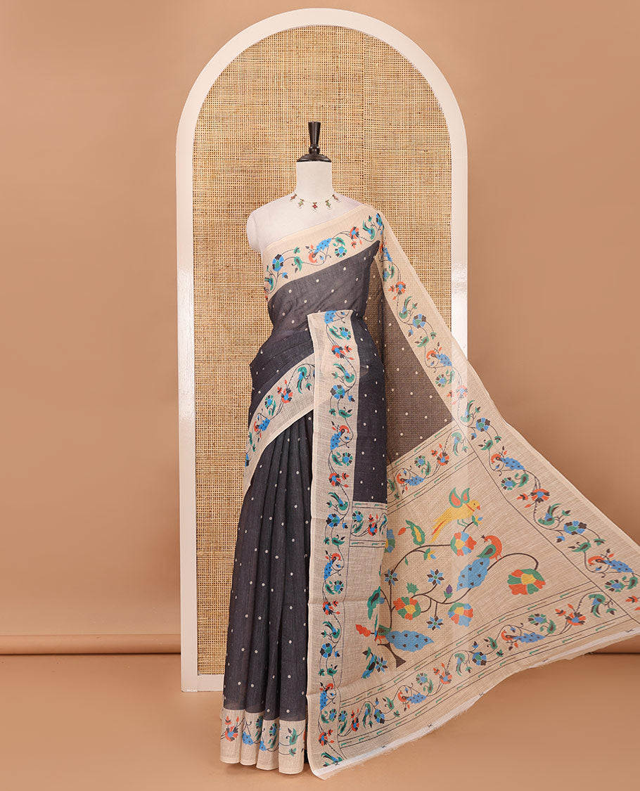 Black small dotted buttas linen cotton saree, contrast border & pallu of paithani-style parrot, peacock, & floral vine designs