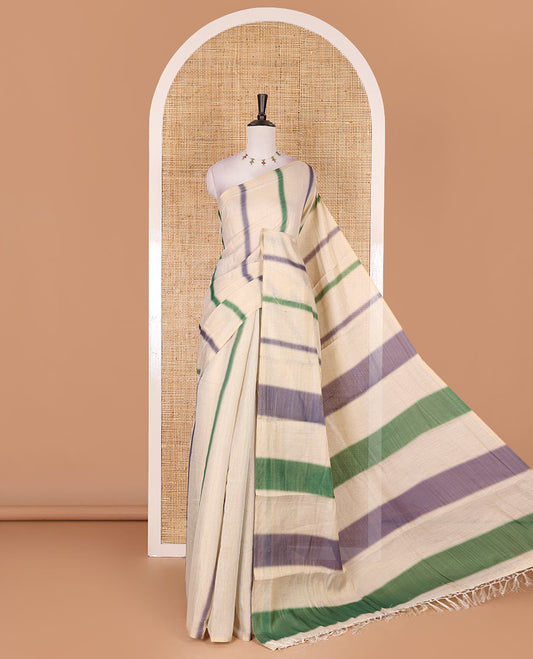 Borderless cream, colorful striped tissue saree, unique motifs printed green color blouse