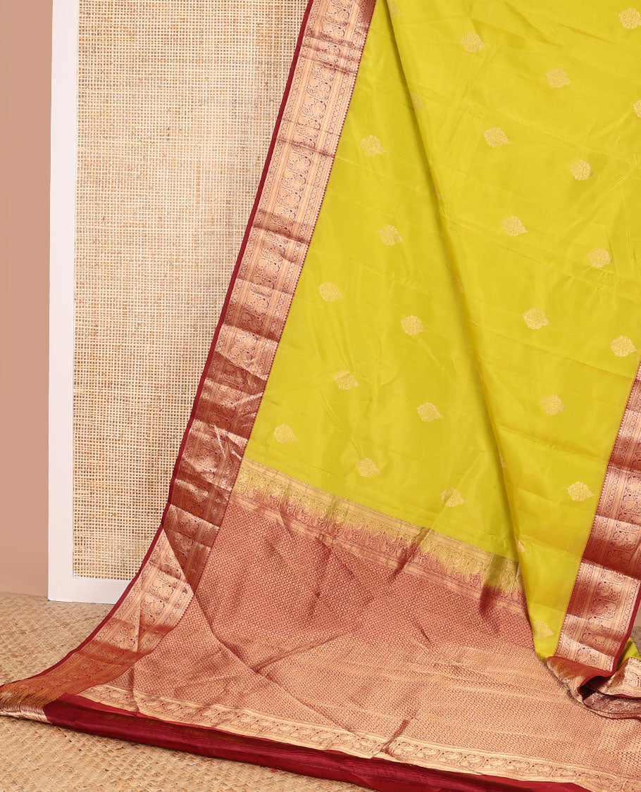 Light green buttas vasundhara elite silk saree with contrast traditional zari design border & checked floral design pallu