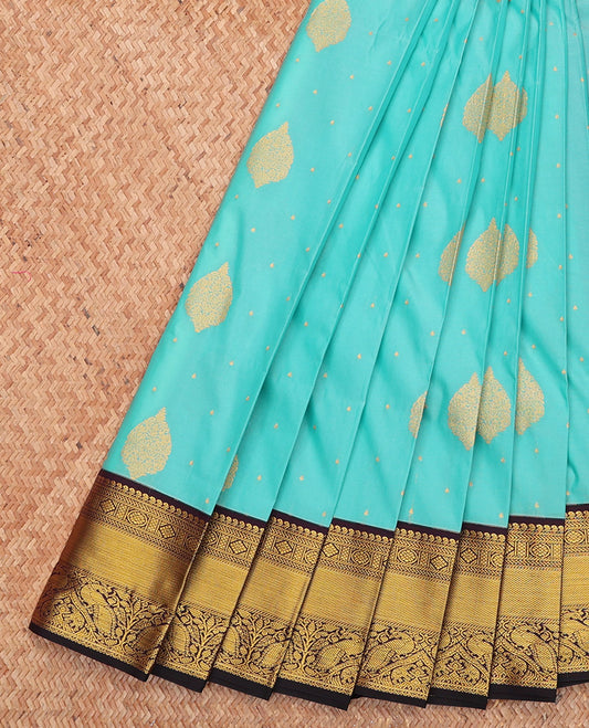 Turquoise Budget Silk Saree, Elevated with Zari Buttas, Complemented by a Contrast Traditional Border, Grand Pallu, and a Contrast Blouse