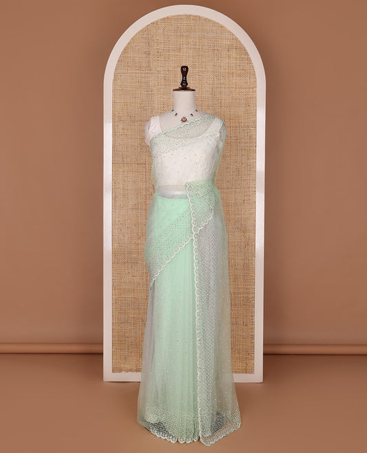 Pista green crystal stone & pearl beads embroidered designer saree with scallop embroidered border