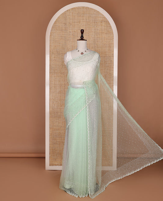Pista green crystal stone & pearl beads embroidered designer saree with scallop embroidered border
