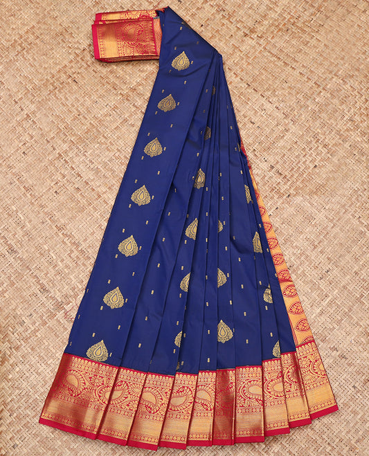 Navy Blue Budget Silk Saree, Adorned with Zari Buttas on Its Body, Complemented by a Contrast Traditional Zari Border of Paisleys, Intricately Designed Pallu, and Paired with a Contrast Blouse