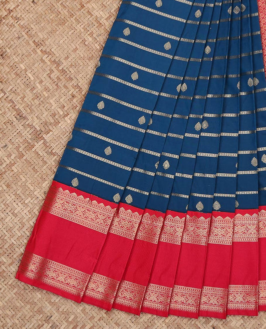 Blue Budget Silk Saree, Gracefully Embellished with Zari Buttas and Zari Stripes on Its Body, Complemented by a Contrast Traditional Zari Rettai Pettu Border, Grand Jaal Pallu, and Paired with a Contrast Blouse