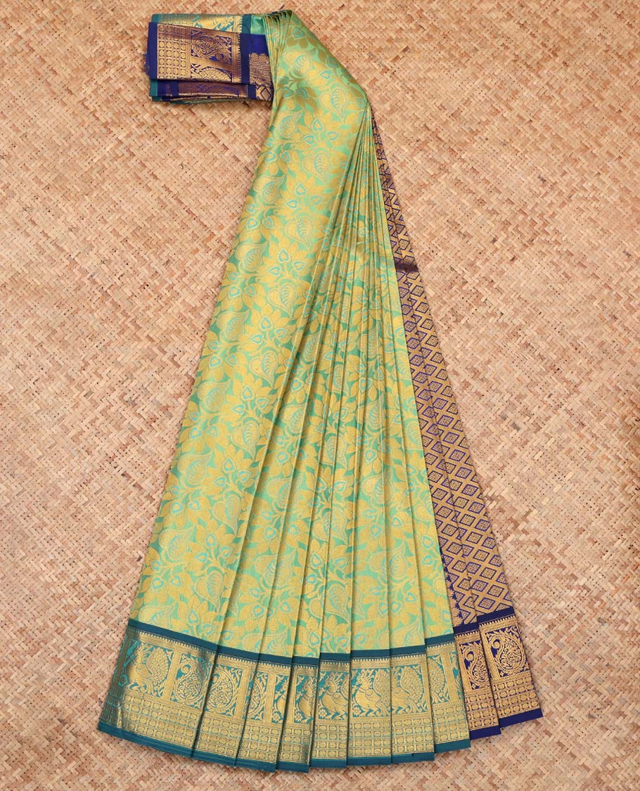 Green Budget Silk Saree, Enlivened with Floral Vine Design, Complemented by Contrast Traditional Peacock and Paisley Zari Border, a Jaal Pallu and a Contrast Blouse