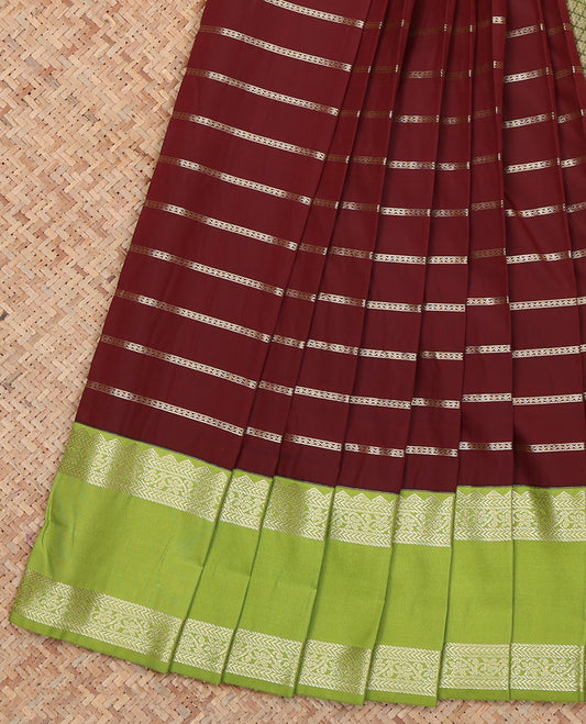 Maroon Budget Silk Saree, Bedecked with Neli Stripes, a Contrast Traditional Zari Rettai Pettu Border, Jaal Pallu, and a Contrast Blouse