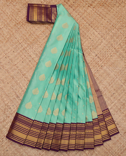Turquoise Budget Silk Saree, Sparsely Threaded with Zari Buttas, a Contrast Traditional Zari Border, Grand Pallu, and a Contrast Blouse