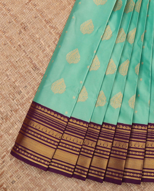 Turquoise Budget Silk Saree, Sparsely Threaded with Zari Buttas, a Contrast Traditional Zari Border, Grand Pallu, and a Contrast Blouse