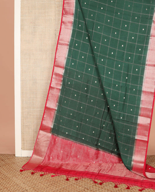 Green buttas enclosed checked assam silk saree, contrast traditional zari border, and pallu of zari design